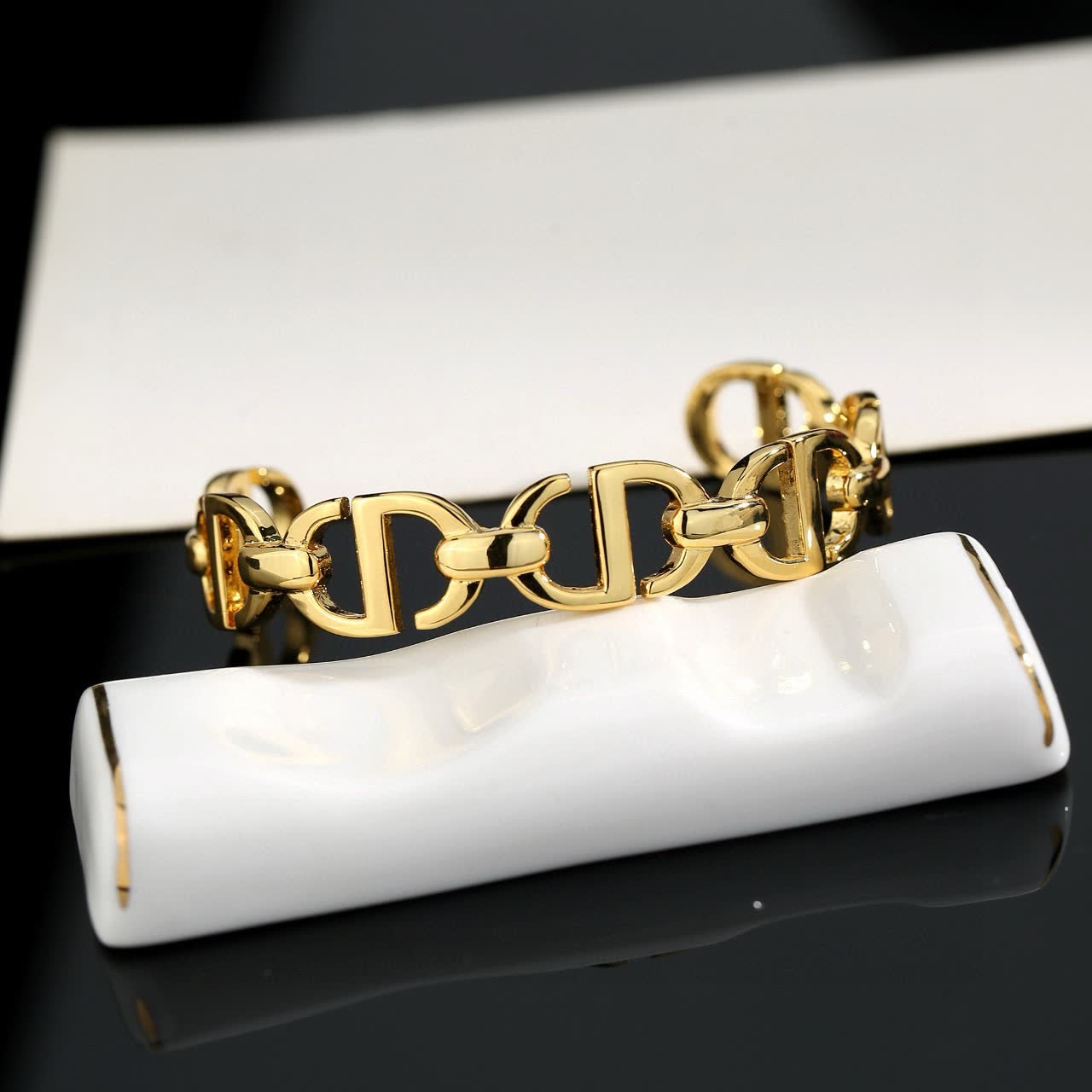Louis Vuitton Christian Gold Tone Cuff Bracelet